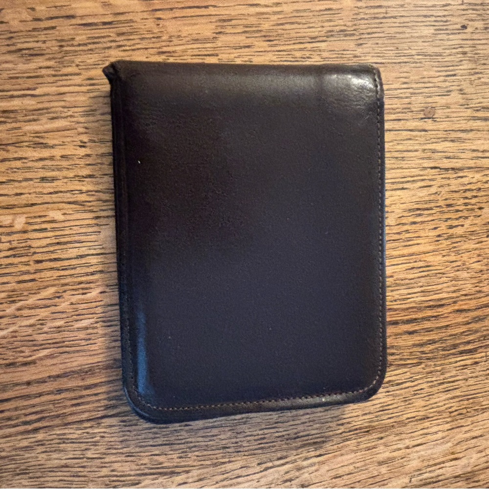 Rolfs brown cowhide leather “Golden O Circle” wallet. 6 credit card slot…